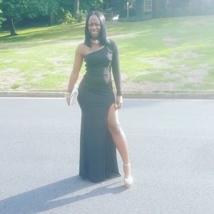 A black one sleeve gown